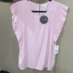Boutique Blouse New with Tags. Dusty Rose with ruffle sleeves.